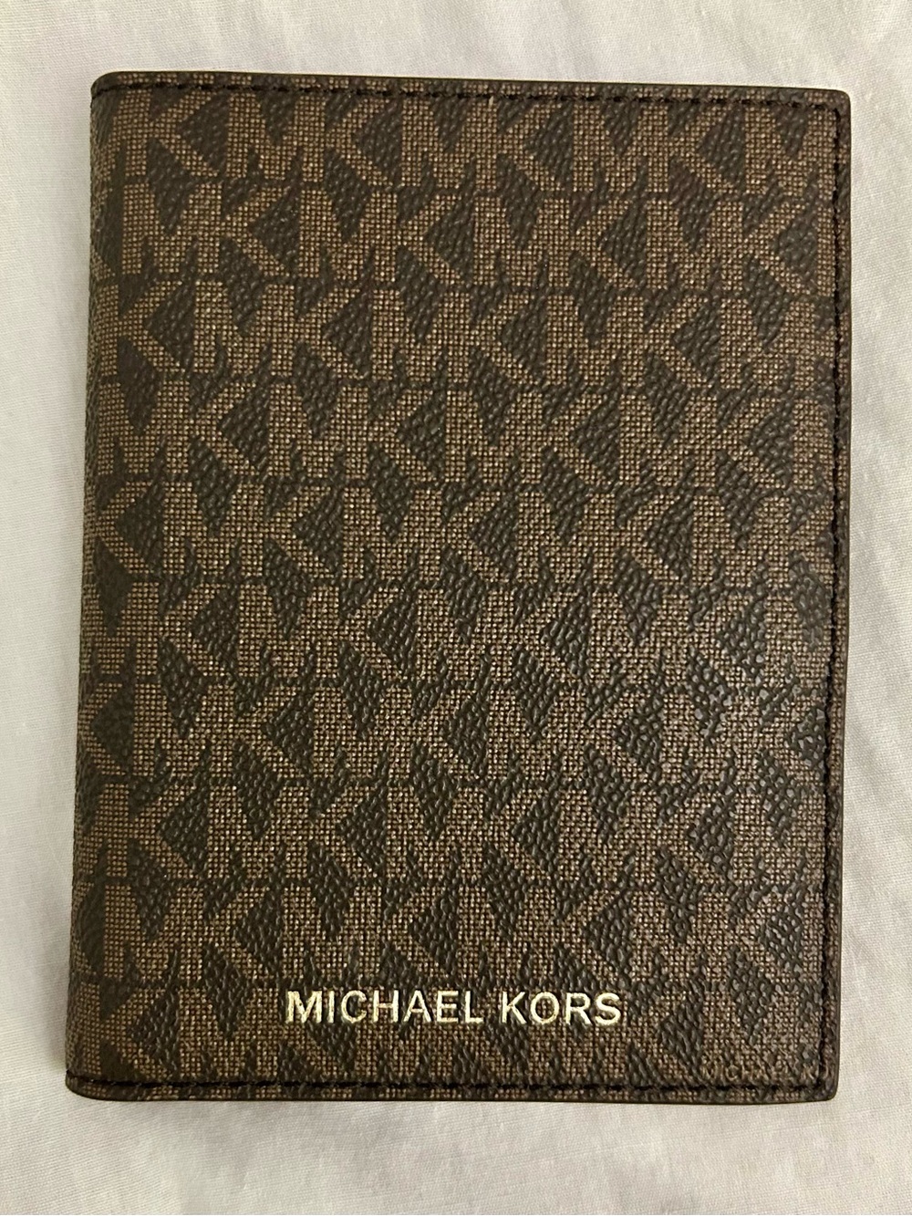 Michael Kors Tan Leather passport holder with Embossed Logo